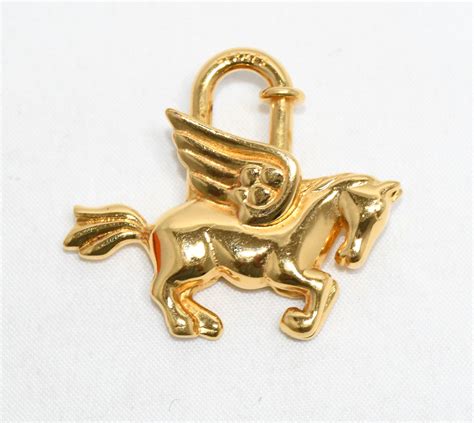 hermes cadena gold pegasus horse motif bag charm lock 071|Hermes Cadena Gold Pegasus horse motif bag charm lock .